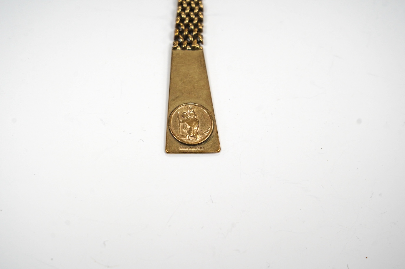 A 9ct gold key chain, with engraved inscription and a yellow metal band, gross weight 17.2 grams. Condition - fair